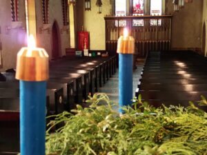 Two candles from the Advent wreath lit