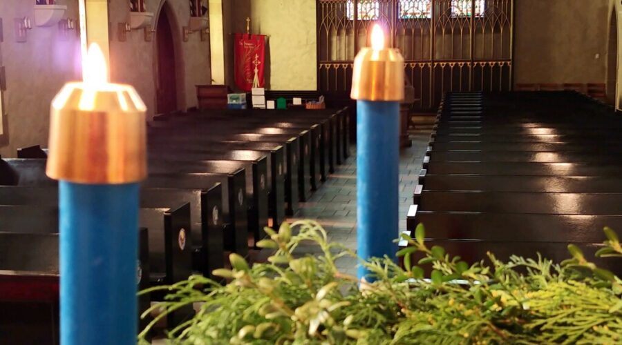 Two candles from the Advent wreath lit