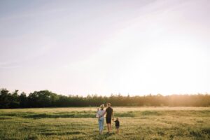 a family in a field