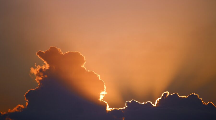 light bursting past a cloud