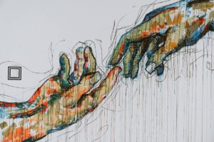 a drawing of two hands touching