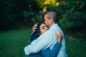 a man hugging a woman