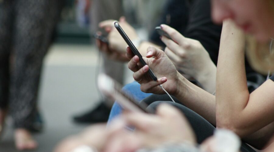 people holding cell phones