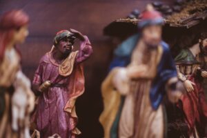 a closeup of a wise man in a nativity scene