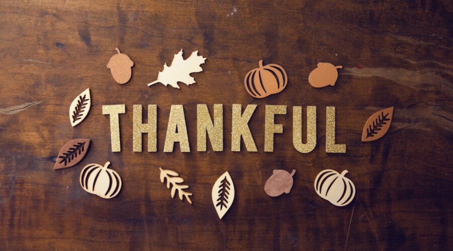 A table decorated with the word "thankful"